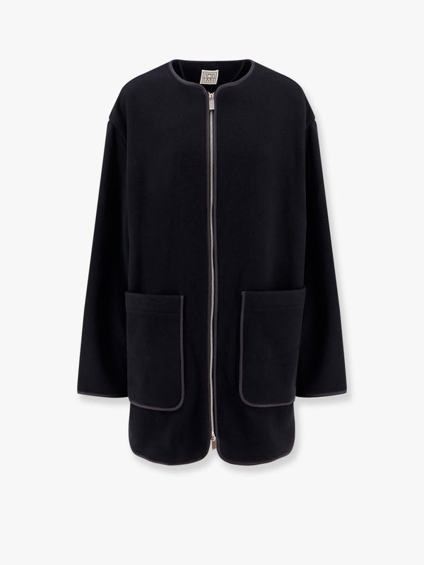 Wool blend coat with lateral slits