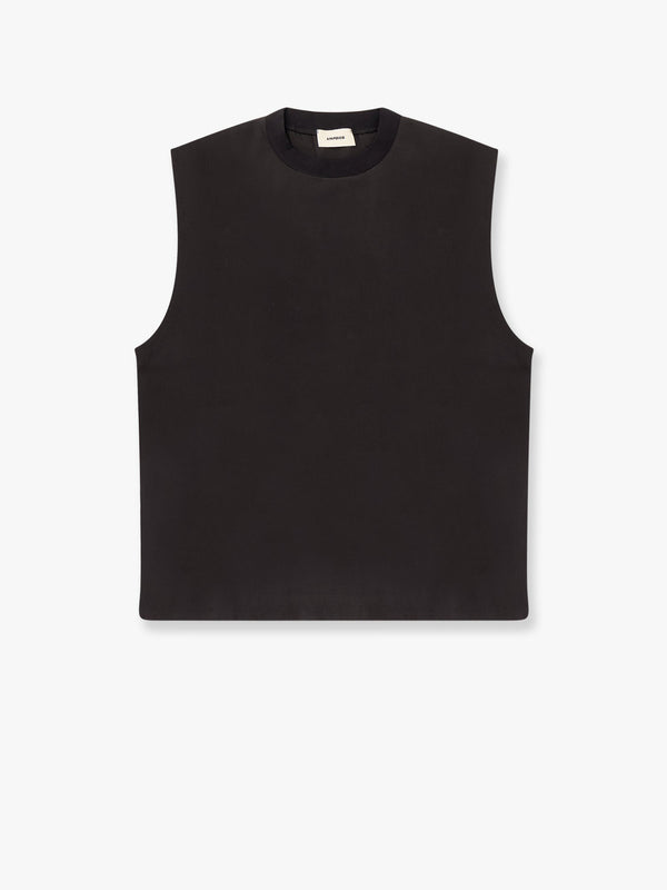 Modal top with rhinestone logo patch on the back