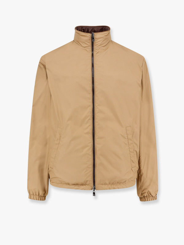 Reversible leather and nylon jacket with adjustable drawstring