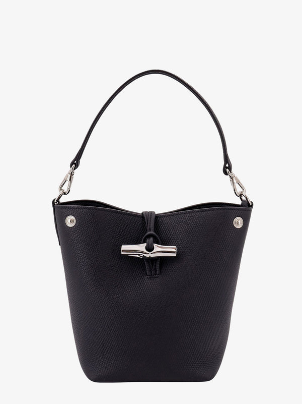 Le roseau leather bag with lateral snap buttons