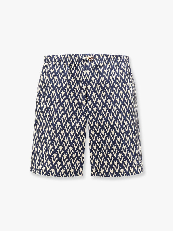 Linen bermuda shorts with toute la v motif