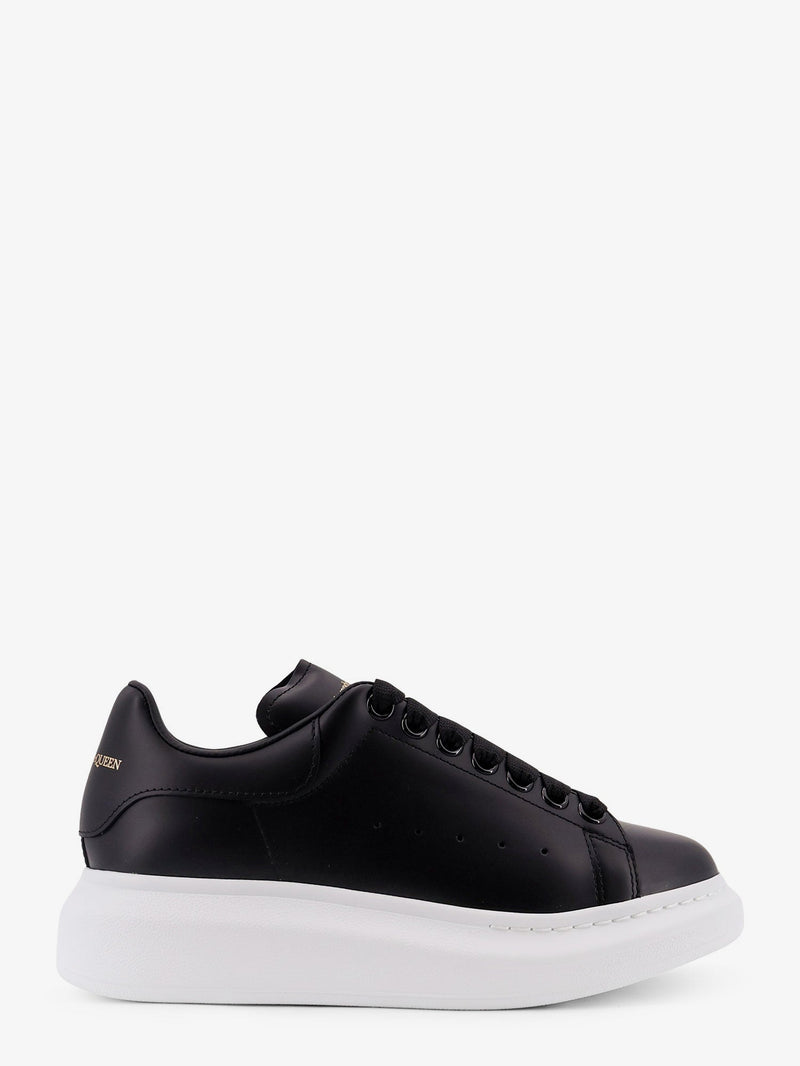 Alexander McQueen Zapatillas de piel oversize Alexander McQueen negras - World Class Fashion