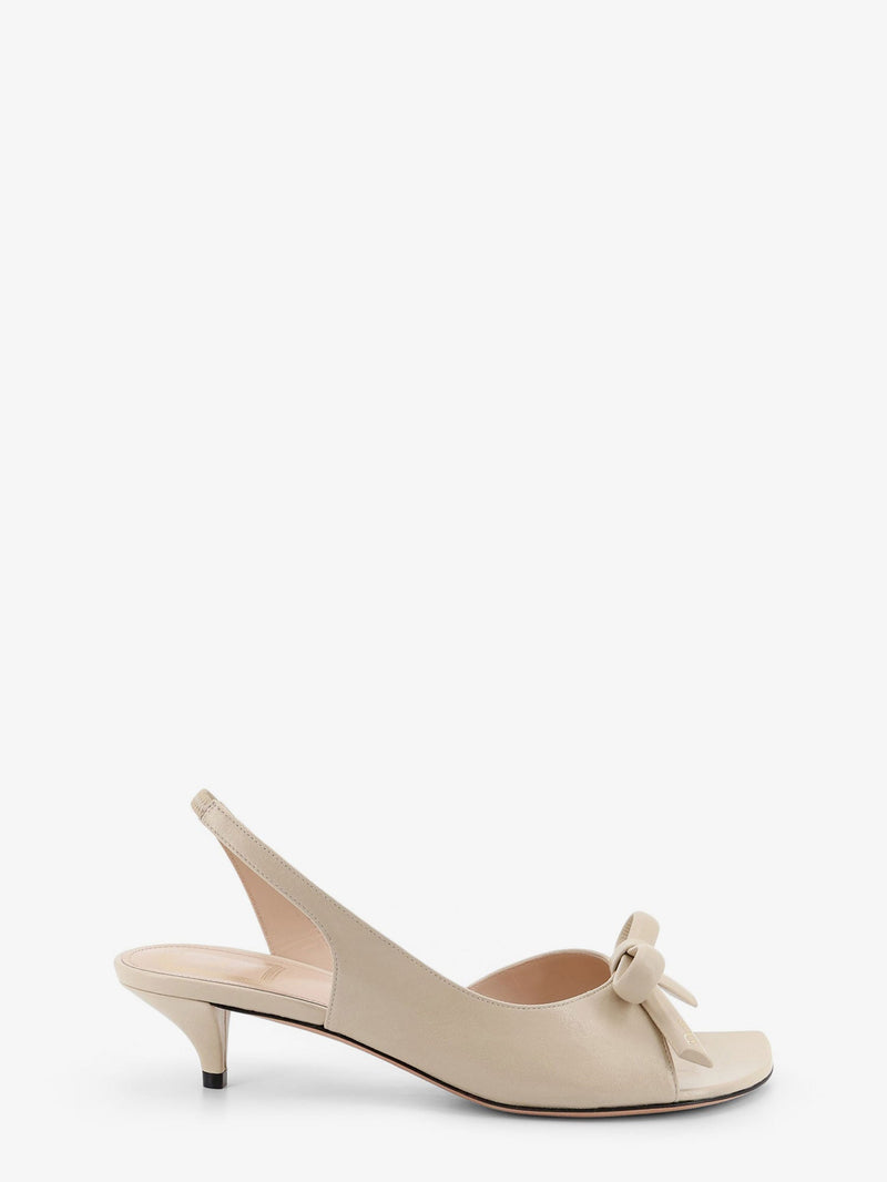 Dior Sandalias Dior Bow de piel beige para mujer - World Class Fashion