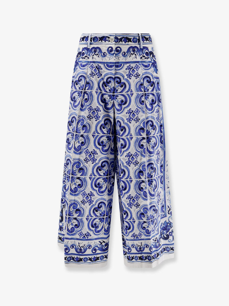 Dolce & Gabbana Pantalones de algodón con estampado Maiolica de Dolce & Gabbana, azules - World Class Fashion