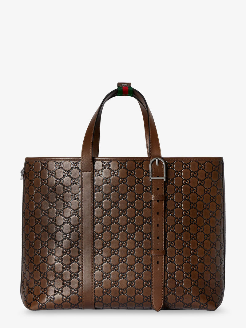 Gucci Bolsa de la compra Gucci GG Emblem de cuero marrón - World Class Fashion