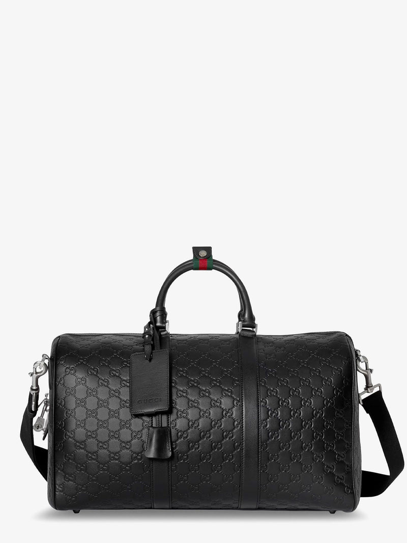 Gucci Gucci Bolso de Viaje de Lona Revestida con Emblema GG Negro - World Class Fashion