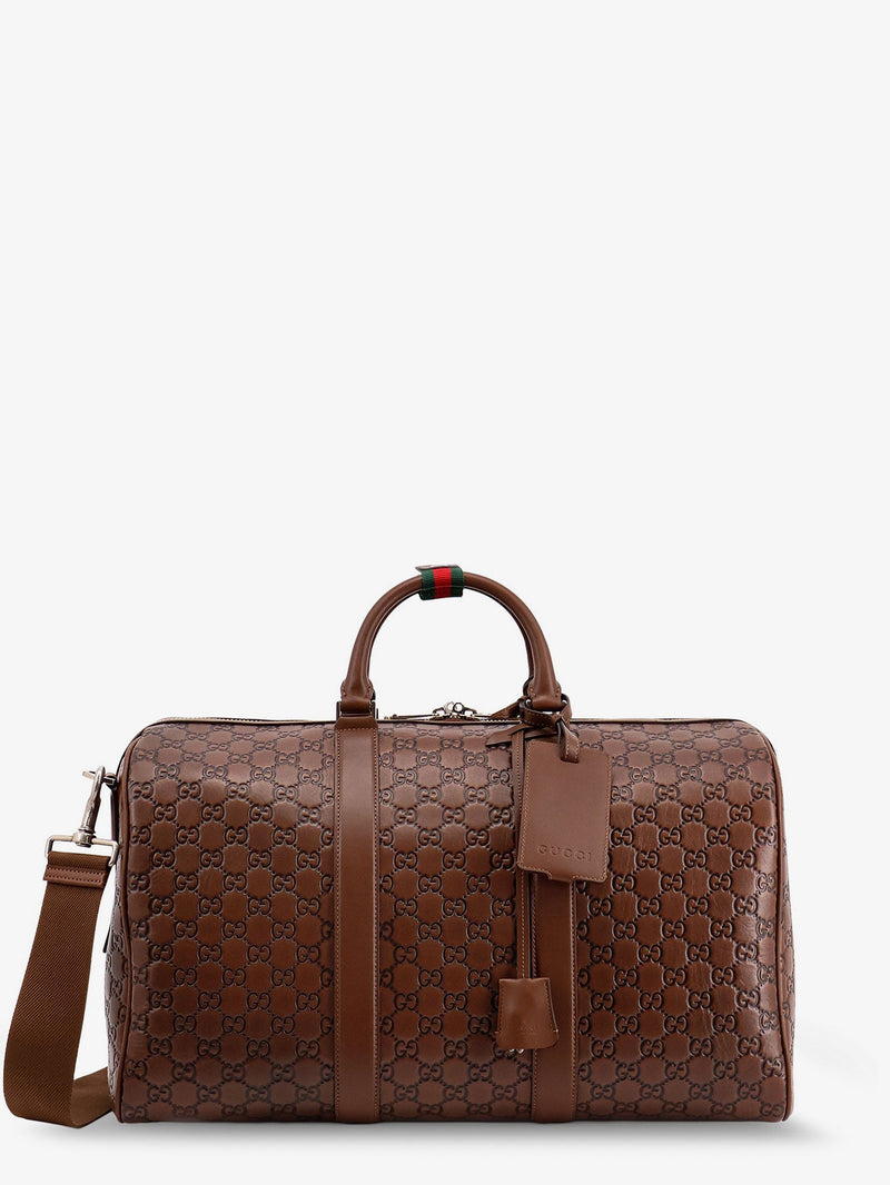 Gucci Bolso de viaje Gucci GG Emblem Marrón - World Class Fashion