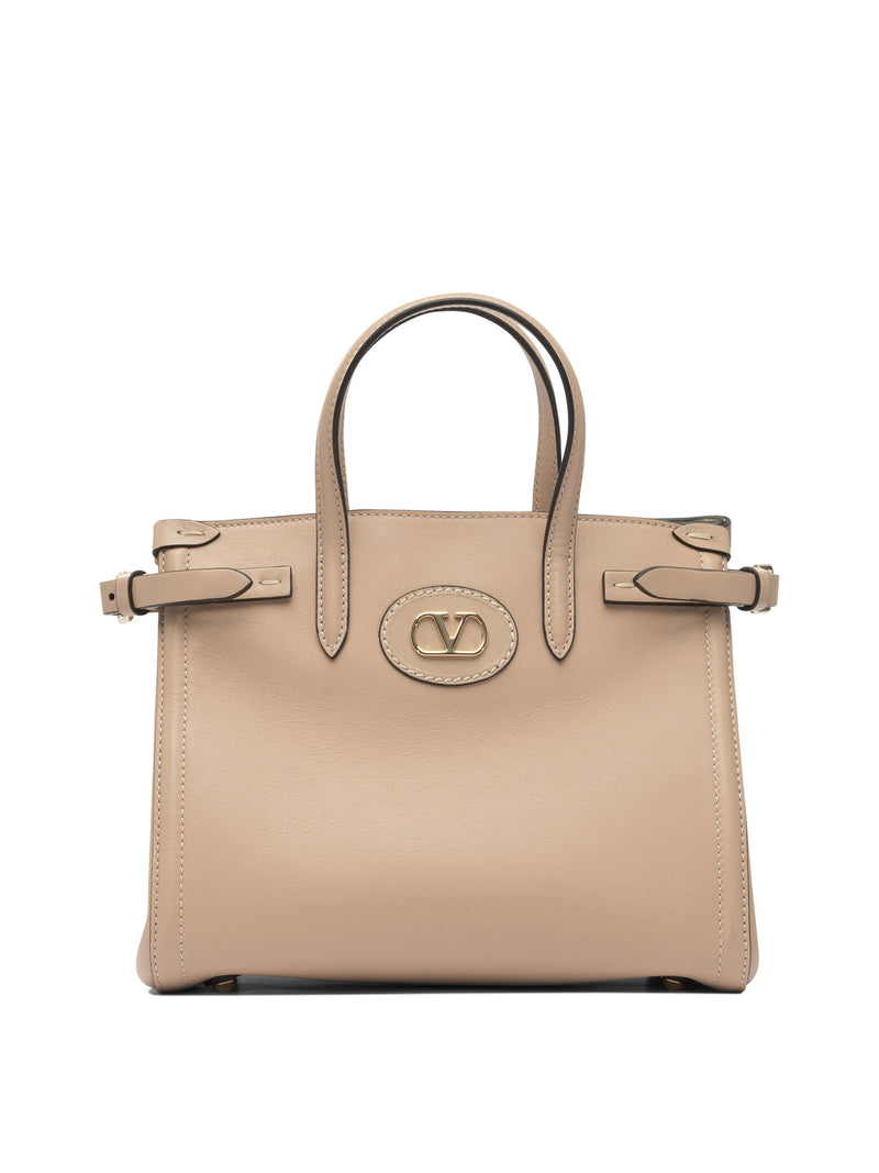 Valentino Garavani Bolso de mano Valentino Garavani para mujer de cuero rosa - World Class Fashion