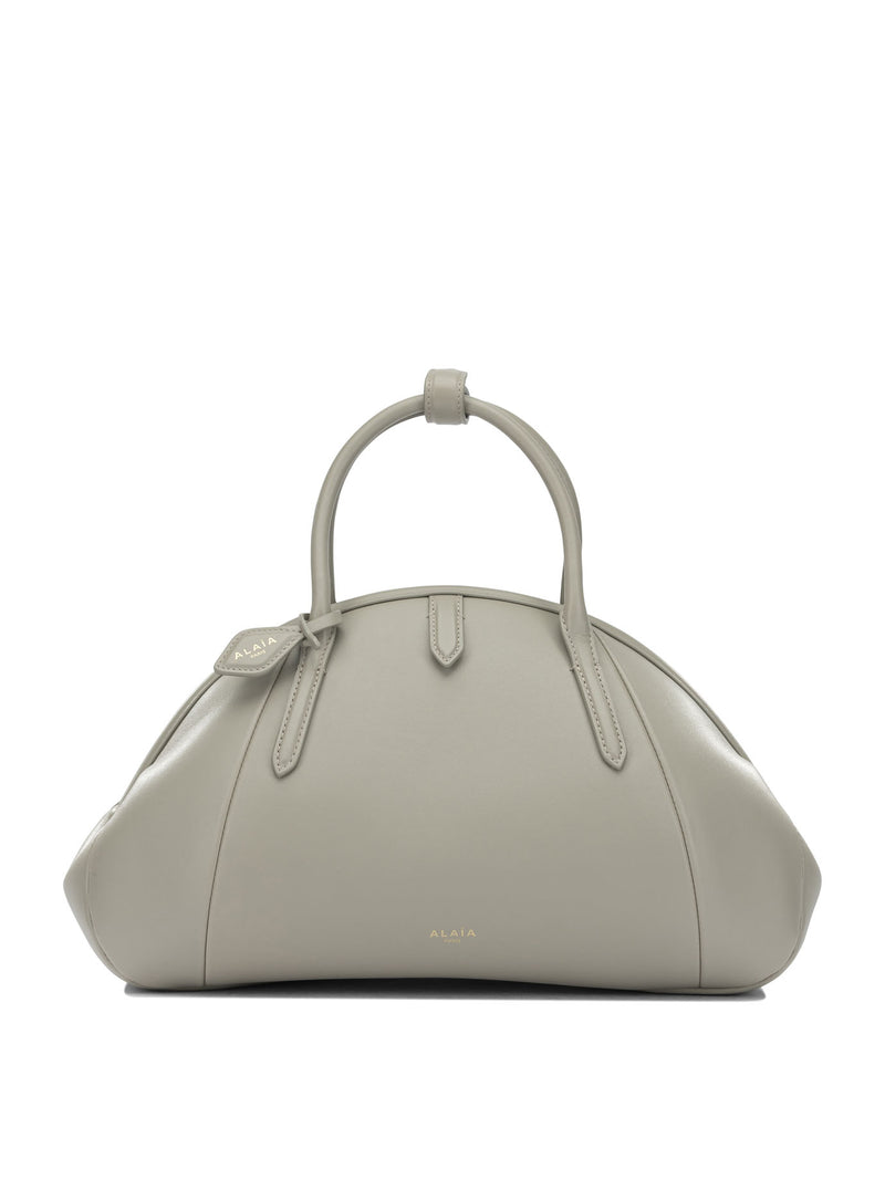 Alaia Bolso de mano mediano Alaïa en color beige - World Class Fashion