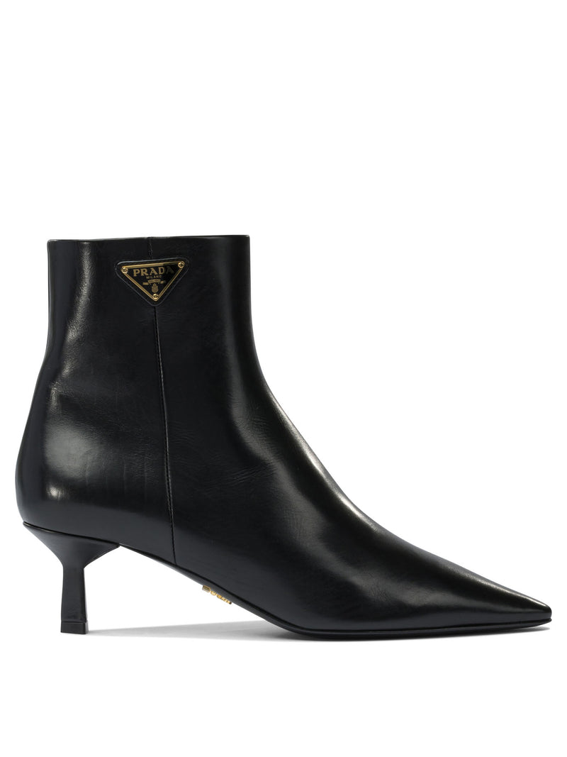 Prada Botines de piel con logo de Prada para mujer, color negro - World Class Fashion