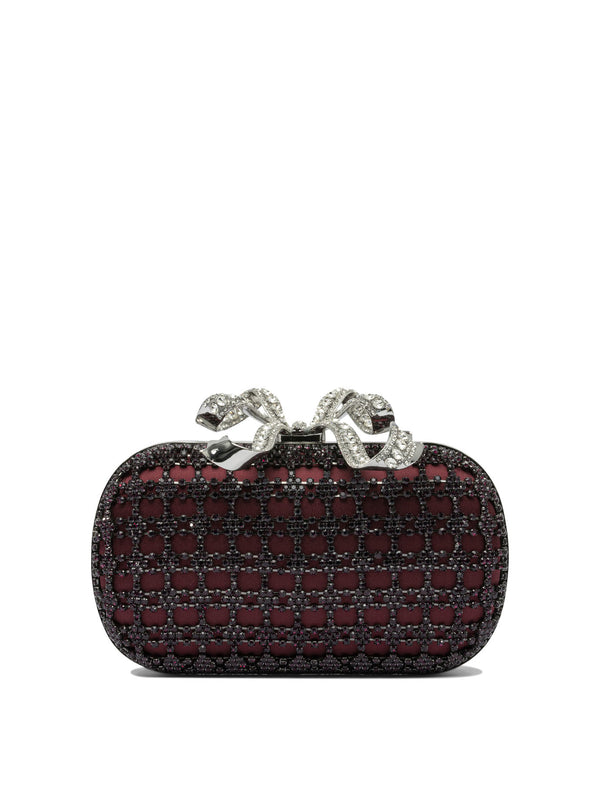Self-portrait Clutches